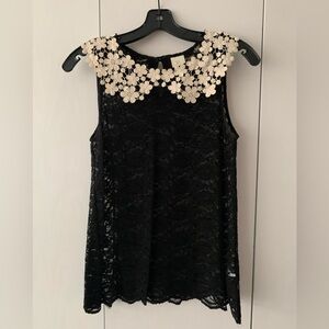 Black and cream lace top from Anthropologie. Excellent condition.